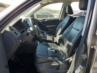 2014 Volkswagen Tiguan SE with VIN WVGAV3AX8EW619044, listed as a Copart auction lot 46990185 with 171,972 mi miles and Salvage title. Bid and sale history available at DreamBid. Image 7.
