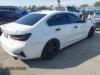 2019 BMW 3 Series 330i with VIN WBA5R1C59KAJ99746, listed as a IAAI auction lot 41566192 with 55,090 mi miles and . Bid and sale history available at DreamBid. Image 4.