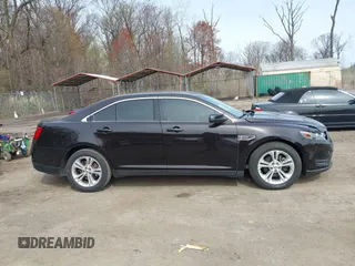 2013 Ford Taurus SEL with VIN 1FAHP2E87DG220389, listed as a IAAI auction lot 41930118 with 128,324 mi miles and . Bid and sale history available at carsss.com. Image 13.