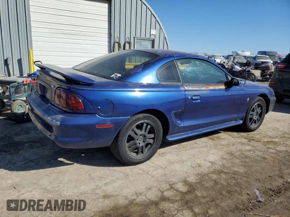 1997 Ford Mustang with VIN 1FALP404XVF156625, listed as a Copart auction lot 43497705 with 194,551 mi miles and Salvage Title. Bid and sale history available at carsss.com. Image 3.