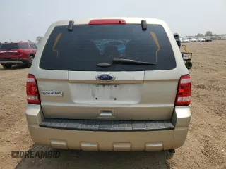 2011 Ford Escape XLS with VIN 1FMCU0C75BKC58172, listed as a Copart auction lot 60492825 with 114,518 mi miles and Salvage title. Bid and sale history available at DreamBid. Image 6.