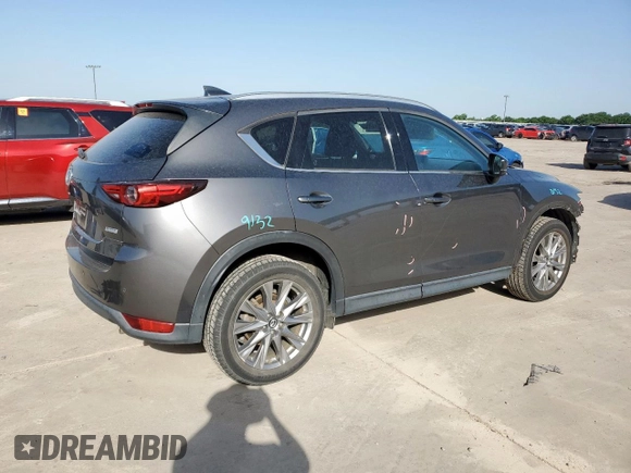 2019 Mazda CX-5 Grand Touring with VIN JM3KFADM8K1634011, listed as a Copart auction lot 57343455 with 67,138 mi miles and Salvage title. Bid and sale history available at DreamBid. Image 3.