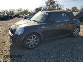 2014 MINI Convertible S with VIN WMWZP3C55ET298172, listed as a Copart auction lot 76977114 with 119,138 mi miles and Salvage Title. Bid and sale history available at DreamBid. Image 1.