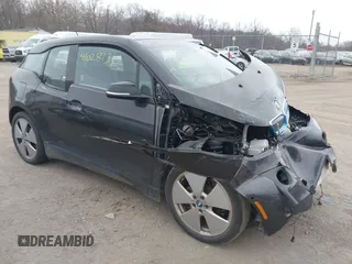 2015 BMW i3 with VIN WBY1Z4C5XFV501268, listed as a IAAI auction lot 41028732 with 75,283 mi miles. Bid and sale history available at carsss.com. Image 1.