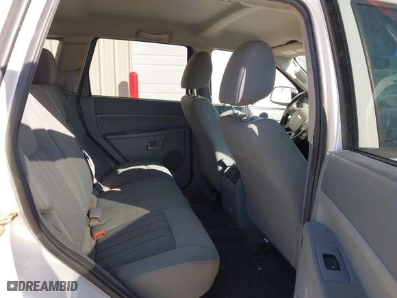 2006 Jeep Grand Cherokee Laredo with VIN 1J4GS48K36C279970, listed as a IAAI auction lot 41655785 with 180,348 mi miles. Bid and sale history available at carsss.com. Image 8.
