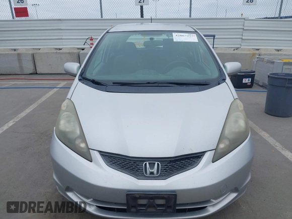 2013 Honda Fit with VIN JHMGE8H38DC002109, listed as a IAAI auction lot 42067257 with 305,739 mi miles. Bid and sale history available at carsss.com. Image 12.