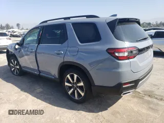 2023 Honda Pilot Touring with VIN 5FNYG2H7XPB011420, listed as a Copart auction lot 69799314 with 9,601 mi miles and Salvage Title. Bid and sale history available at carsss.com. Image 2.