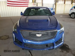2019 Cadillac CTS-V z VIN 1G6A15S6XK0101553, wystawiony jako Copart lot #57943355 z przebiegiem 4 093 mil mil oraz Czysty tytuł • Clean title. Historia ofert i sprzedaży dostępna na DreamBid. Obrazek 5.