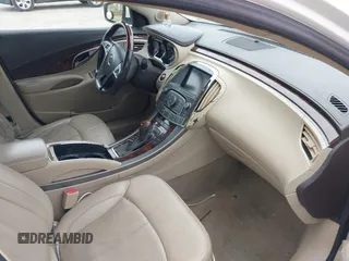 2012 Buick LaCrosse Premium 2 z VIN 1G4GF5E34CF289314, wystawiony jako IAAI lot #42331342 z przebiegiem 300 129 mil mil oraz . Historia ofert i sprzedaży dostępna na DreamBid. Obrazek 5.