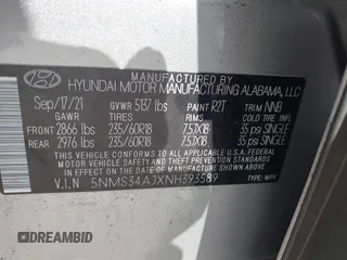 2022 Hyundai Santa Fe SEL with VIN 5NMS34AJXNH393589, listed as a IAAI auction lot 41908857 with 22,661 mi miles and . Bid and sale history available at DreamBid. Image 9.