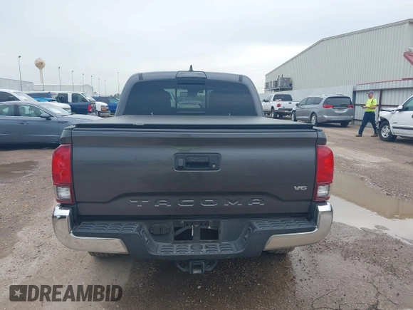 2018 Toyota Tacoma SR5 with VIN 5TFAZ5CN5JX062498, listed as a IAAI auction lot 41867393 with 128,879 mi miles and . Bid and sale history available at DreamBid. Image 17.