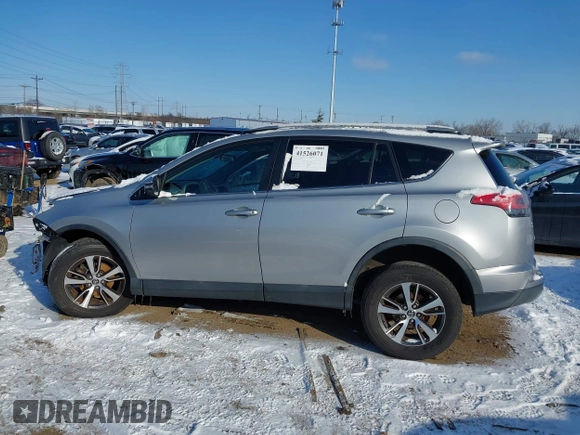 2018 Toyota RAV4 XLE with VIN 2T3RFREV8JW753853, listed as a IAAI auction lot 41526071 with 104,642 mi miles. Bid and sale history available at carsss.com. Image 15.