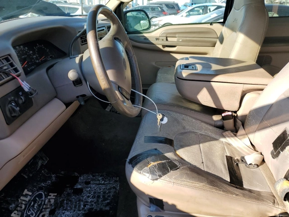 1999 Ford F-250 XL with VIN 1FTNX21L7XED97757, listed as a Copart auction lot 42296985 with 168,728 mi miles and Salvage title. Bid and sale history available at DreamBid. Image 7.