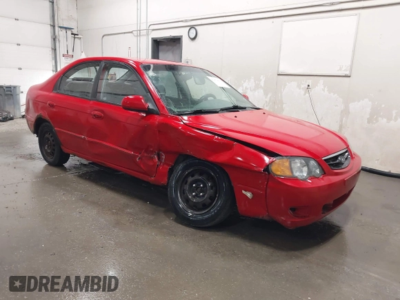 2003 Kia Spectra GS z VIN KNAFB161035115874, wystawiony jako IAAI lot #42179809 z przebiegiem 127 594 mil mil oraz . Historia ofert i sprzedaży dostępna na DreamBid. Obrazek 1.