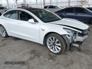 2020 Tesla Model 3 Long Range with VIN 5YJ3E1EB5LF801530, listed as a IAAI auction lot 41682050 with 65,743 mi miles. Bid and sale history available at carsss.com. Image 1.