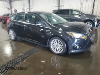 2014 Ford Focus Titanium with VIN 1FADP3N2XEL131392, listed as a Copart auction lot 61665025 with 105,597 mi miles and Salvage title. Bid and sale history available at DreamBid. Image 4.