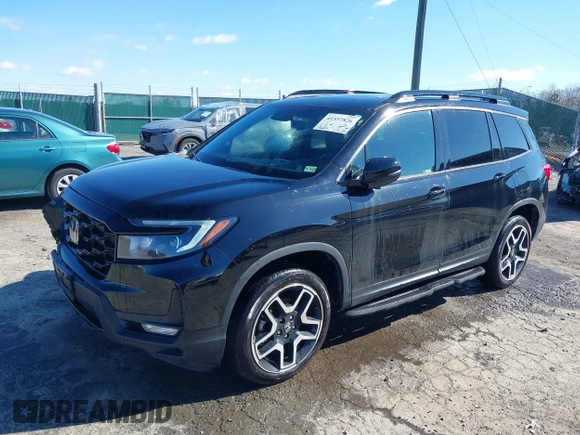 2023 Honda Passport Elite with VIN 5FNYF8H04PB006514, listed as a IAAI auction lot 41537826 with 14,640 mi miles and . Bid and sale history available at DreamBid. Image 18.