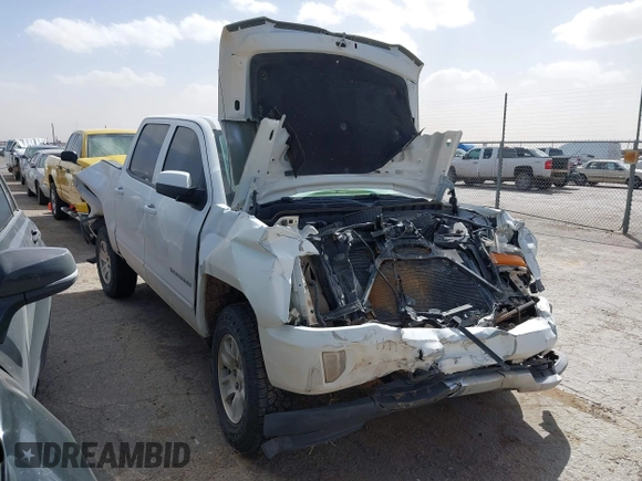 2018 Chevrolet Silverado 1500 LT with VIN 3GCUKREC9JG316576, listed as a IAAI auction lot 41830992 with 153,467 mi miles. Bid and sale history available at carsss.com. Image 1.