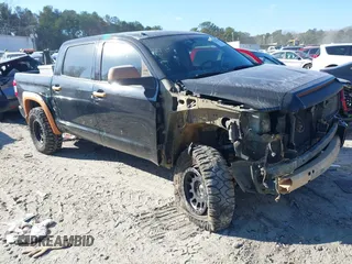 2014 Toyota Tundra Platinum with VIN 5TFAW5F10EX400395, listed as a IAAI auction lot 41231404 with 152,445 mi miles and . Bid and sale history available at DreamBid. Image 1.