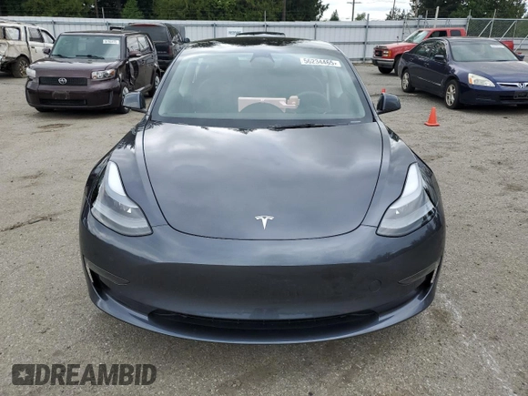2023 Tesla Model 3 z VIN 5YJ3E1EA7PF683249, wystawiony jako Copart lot #56234465 z przebiegiem 9 494 mil mil oraz Szkoda całkowita • Salvage title. Historia ofert i sprzedaży dostępna na DreamBid. Obrazek 5.
