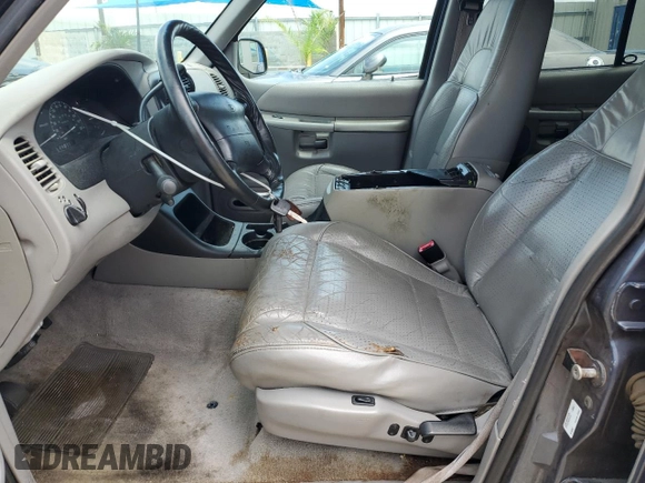 1998 Ford Explorer XLT z VIN 1FMZU32E6WUD38246, wystawiony jako Copart lot #66407954 z przebiegiem 103 018 mil mil oraz Szkoda całkowita • Salvage title. Historia ofert i sprzedaży dostępna na DreamBid. Obrazek 7.