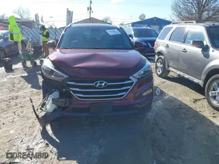 2017 Hyundai Tucson SE Plus with VIN KM8J33A45HU391175, listed as a IAAI auction lot 41803304 with 70,784 mi miles. Bid and sale history available at carsss.com. Image 13.