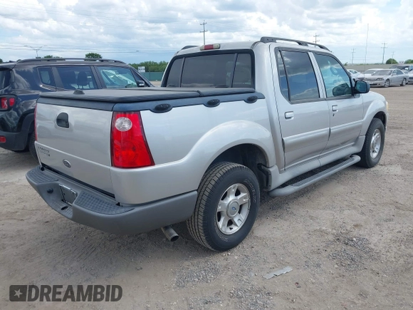 2003 Ford Explorer Sport Trac XLS z VIN 1FMZU67E43UA72537, wystawiony jako IAAI lot #42575959 z przebiegiem 142 692 mil mil oraz . Historia ofert i sprzedaży dostępna na DreamBid. Obrazek 4.