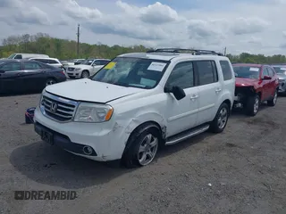 2014 Honda Pilot EX-L with VIN 5FNYF3H50EB005811, listed as a IAAI auction lot 42115804 with 216,033 mi miles and . Bid and sale history available at DreamBid. Image 17.