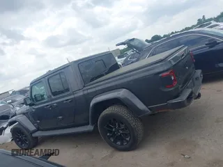 2021 Jeep Gladiator Overland with VIN 1C6HJTFG4ML617175, listed as a IAAI auction lot 42148031 with 70,627 mi miles and . Bid and sale history available at DreamBid. Image 14.
