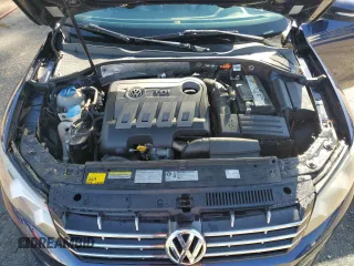 2014 Volkswagen Passat SE z VIN 1VWBN7A36EC053431, wystawiony jako Copart lot #49343735 z przebiegiem 102 845 mil mil oraz Szkoda całkowita • Salvage title. Historia ofert i sprzedaży dostępna na DreamBid. Obrazek 11.