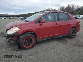 2010 Nissan Versa 1.8 S with VIN 3N1BC1AP4AL371722, listed as a Copart auction lot 72641144 with 128,445 mi miles and Salvage Title. Bid and sale history available at carsss.com. Image 1.