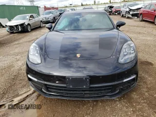 2018 Porsche Panamera 4 E-Hybrid z VIN WP0AE2A72JL127720, wystawiony jako Copart lot #71872404 z przebiegiem Nie podano mil oraz Szkoda całkowita • Salvage title. Historia ofert i sprzedaży dostępna na DreamBid. Obrazek 5.