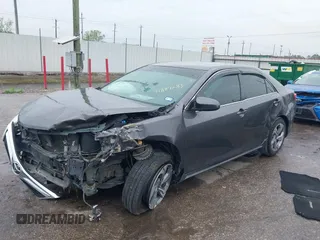 2014 Toyota Camry L with VIN 4T4BF1FK9ER443450, listed as a IAAI auction lot 41889283 with 205,020 mi miles. Bid and sale history available at carsss.com. Image 2.