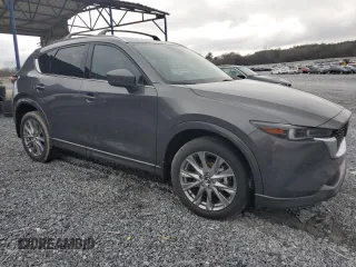 2025 Mazda CX-5 2.5 S Premium Plus Package with VIN JM3KFBEM8S0565119, listed as a Copart auction lot 47956415 with 0 mi miles and Salvage Title. Bid and sale history available at carsss.com. Image 4.