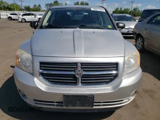 2009 Dodge Caliber R/T z VIN 1B3HB78B49D168677, wystawiony jako Copart lot #58051655 z przebiegiem 104 860 mil mil oraz Szkoda całkowita • Salvage title. Historia ofert i sprzedaży dostępna na DreamBid. Obrazek 5.