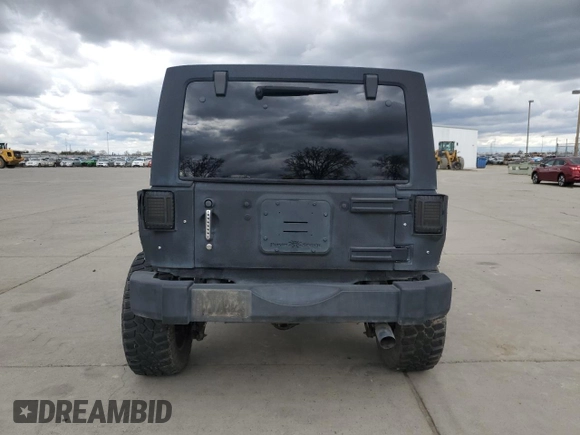 2015 Jeep Wrangler Unlimited Wrangler X with VIN 1C4HJWEG7FL649231, listed as a Copart auction lot 47972905 with 133,895 mi miles and Salvage title. Bid and sale history available at DreamBid. Image 6.