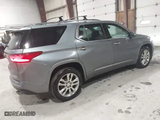 2018 Chevrolet Traverse High Country with VIN 1GNEVKKW1JJ156538, listed as a IAAI auction lot 41670997 with 99,345 mi miles. Bid and sale history available at carsss.com. Image 4.