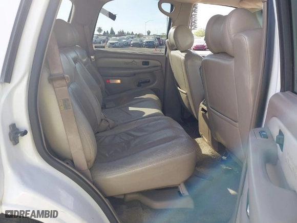 2002 GMC Yukon Denali with VIN 1GKEK63U32J186913, listed as a IAAI auction lot 42030562 with 220,156 mi miles. Bid and sale history available at carsss.com. Image 8.