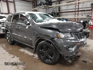 2015 Jeep Grand Cherokee Laredo with VIN 1C4RJFAGXFC752489, listed as a IAAI auction lot 41382389 with 147,892 mi miles. Bid and sale history available at carsss.com. Image 1.