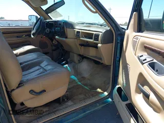 1997 Dodge 1500 z VIN 3B7HF13Z1VG800682, wystawiony jako IAAI lot #42527964 z przebiegiem 180 888 mil mil oraz . Historia ofert i sprzedaży dostępna na DreamBid. Obrazek 5.