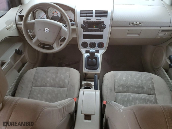 2007 Dodge Caliber with VIN 1B3HB28C27D197491, listed as a Copart auction lot 83700874 with 157,074 mi miles and Salvage Title. Bid and sale history available at carsss.com. Image 8.