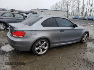 2010 BMW 1 Series 135i with VIN WBAUC7C53AVK96433, listed as a Copart auction lot 86206304 with 48,553 mi miles and Salvage Title. Bid and sale history available at DreamBid. Image 3.