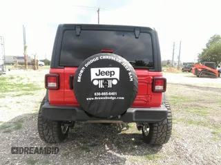 2024 Jeep Wrangler Sport S with VIN 1C4PJXDNXRW110431, listed as a IAAI auction lot 42156570 with 9,699 mi miles. Bid and sale history available at carsss.com. Image 16.