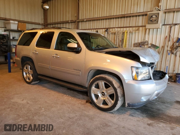 2013 Chevrolet Tahoe LS with VIN 1GNSCAE07DR335358, listed as a Copart auction lot 51713945 with 186,906 mi miles and Salvage title. Bid and sale history available at DreamBid. Image 4.