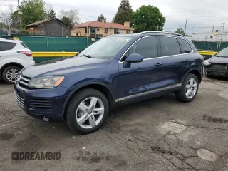 2011 Volkswagen Touareg Sport z VIN WVGFK9BP4BD001551, wystawiony jako Copart lot #58743065 z przebiegiem 142 661 mil mil oraz Szkoda całkowita • Salvage title. Historia ofert i sprzedaży dostępna na DreamBid. Obrazek 1.