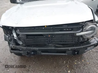 2021 Ford Bronco z VIN 1FMEE5DP7MLA78805, wystawiony jako IAAI lot #42363222 z przebiegiem 57 510 mil mil oraz . Historia ofert i sprzedaży dostępna na DreamBid. Obrazek 6.