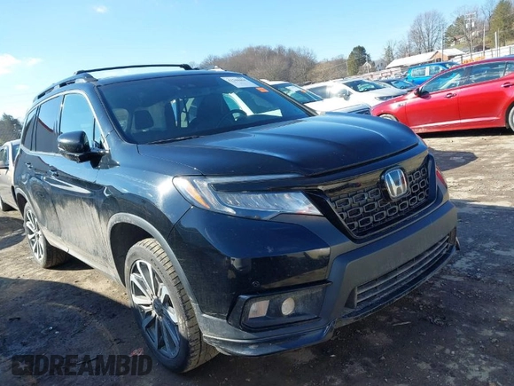2019 Honda Passport Elite z VIN 5FNYF8H07KB014647, wystawiony jako IAAI lot #41544464 z przebiegiem 82 698 mil mil oraz . Historia ofert i sprzedaży dostępna na DreamBid. Obrazek 1.
