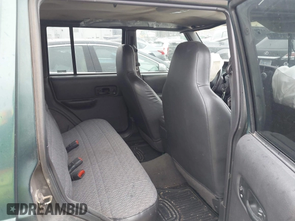2000 Jeep Cherokee with VIN 1J4FT48S6YL102373, listed as a IAAI auction lot 41685817 with 214,106 mi miles and . Bid and sale history available at DreamBid. Image 8.