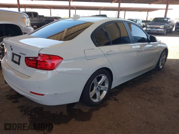 2014 BMW 3 Series 328i with VIN WBA3C1C52EK108503, listed as a IAAI auction lot 42258511 with 151,241 mi miles and . Bid and sale history available at DreamBid. Image 4.