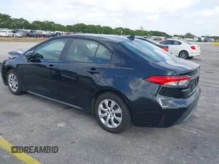 2022 Toyota Corolla LE with VIN 5YFEPMAE6NP348613, listed as a IAAI auction lot 41709618 with 64,406 mi miles and . Bid and sale history available at DreamBid. Image 3.